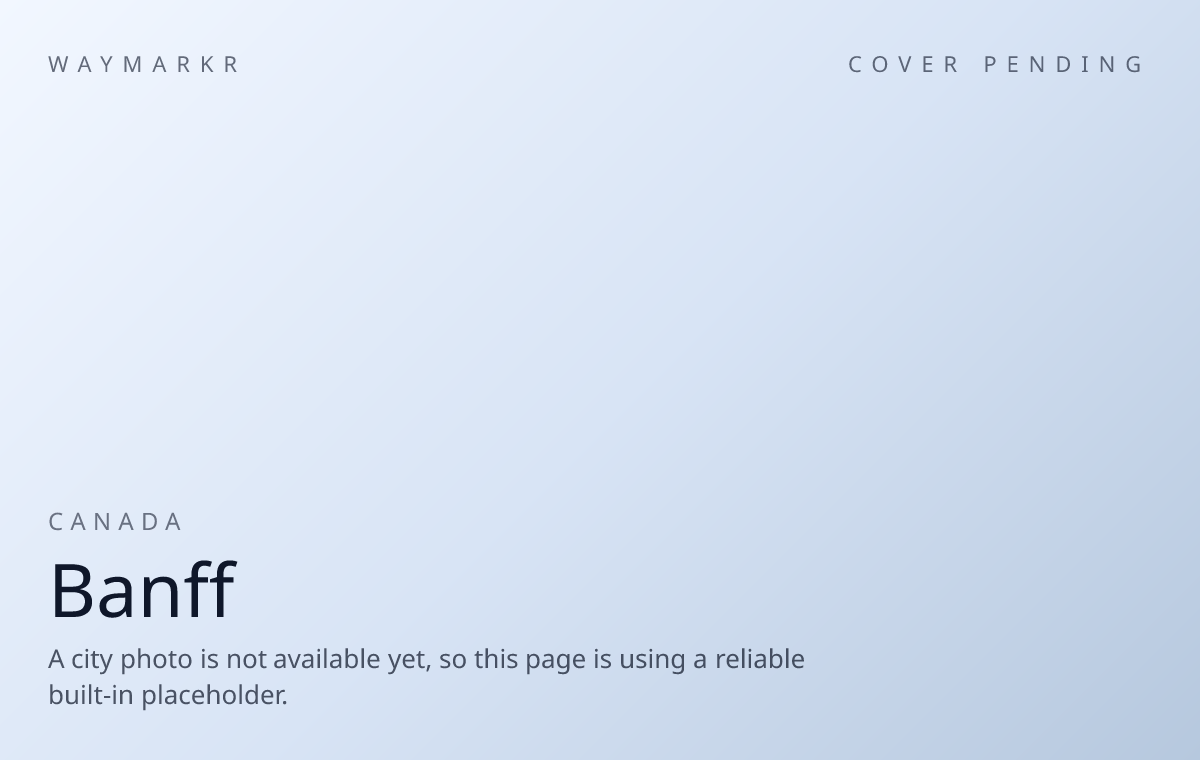 Downtown Banff framed by the Rocky Mountains.