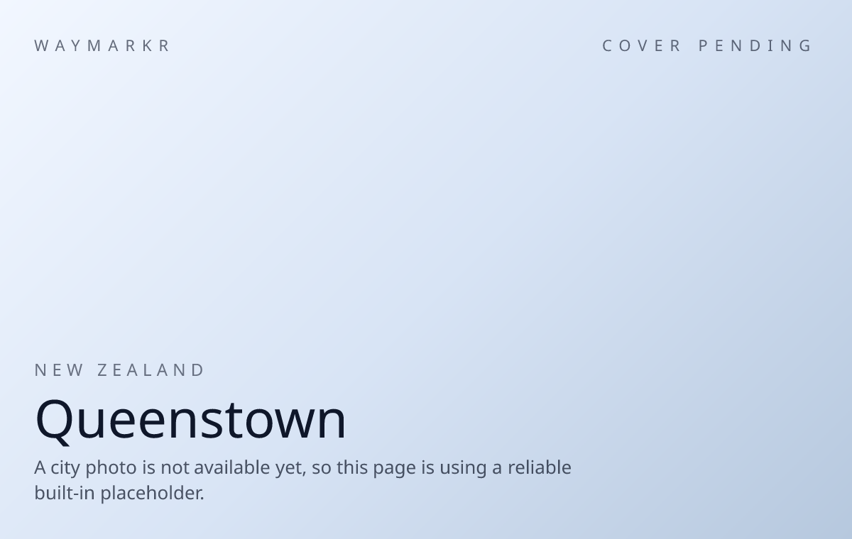 Queenstown beside Lake Wakatipu with mountains in the background.